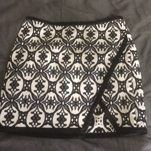 Black, white, grey mini skirt with leather trim